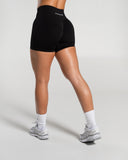 Amplify Mid Rise Short in Black – women's mid-rise seamless compression shorts