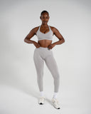 Elevate Bra in LT Heather – Alphalete women's sports bra